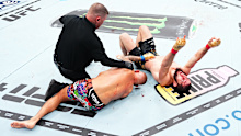 Islam Makhachev celebrates his win over Dustin Poirier at UFC 302. 