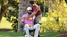 Scottie Scheffler receives treatment for a neck injury. 