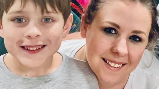 Ms Trimboli, pictured with her eight-year-old son, has been told she will need to wait about 18 months to have laparoscopy in the public health system.
