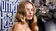 Margot Robbie has debuted a new look at Paris Fashion Week, ditching her Wuthering Heights style. 