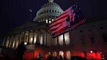 Authorities stand guard outside the U.S. Capitol after supporters of President Donald Trump gathered Wednesday, Jan. 6, 2021, in Washington. (AP Photo/Jacquelyn Martin)