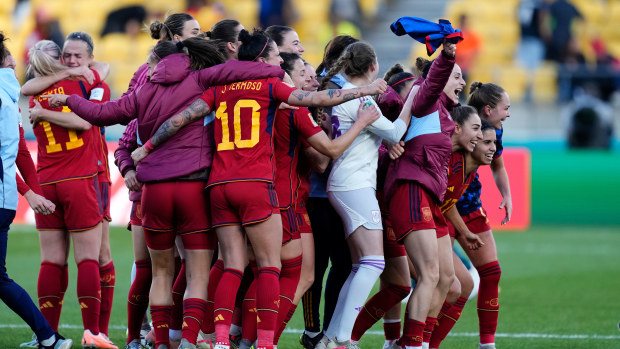 Spanish players celebrate victory after the FIFA Women's World Cup quarter final match against Netherlands. 