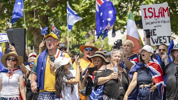 People participate in an anti-immigration, 'Put Australia First,' rally at Prince Alfred Park, Sydney.