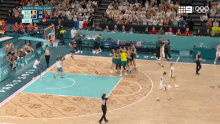 Opals players celebrate after clinching the bronze medal at Paris 2024.