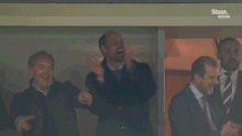 William, Prince of Wales celebrates Aston Villa.