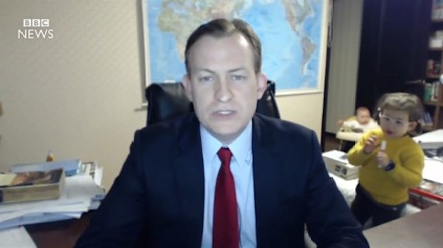 Professor Robert Kelly with his kids during viral interview