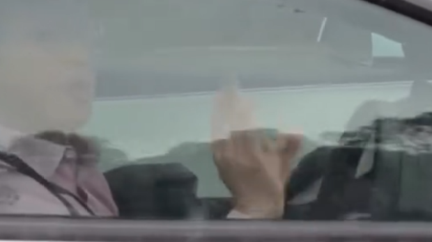 The driver acknowledged the person videoing him.