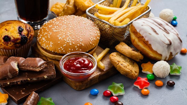 Assortment of unhealthy products that's bad for figure, skin, heart and teeth.