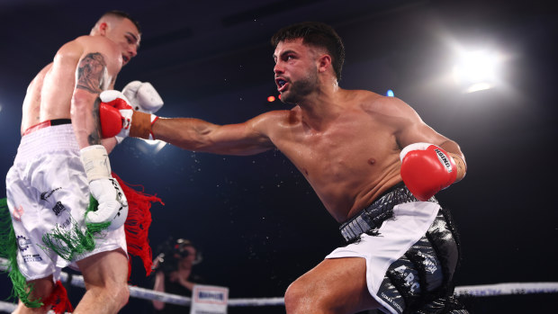 Ricky Esliva and Luke Modini exchange punches during their Cruiserweight fight at The Star Gold Coast on December 03, 2022 in Gold Coast, Australia. (Photo by Chris Hyde/Getty Images)