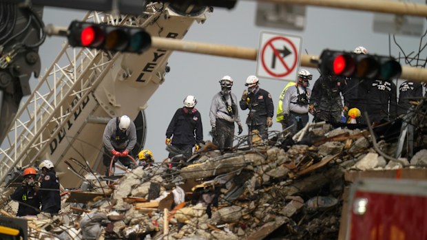 Miami building collapse loss 'too great to bear' as rescuers find children