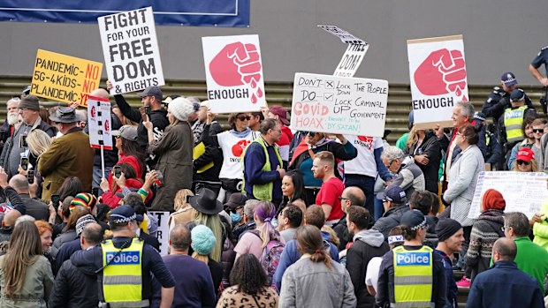 Protesters gather outside Parliament House in Melbourne, Sunday, May 10, 2020. Anti-vaxxers and Victorians fed up with the coronavirus lockdown have broken social distancing rules to protest in Melbourne's CBD on Mother's Day.