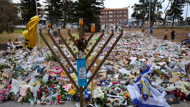 SYDNEY, AUSTRALIA - DECEMBER 21: General view of the memorial at Bondi Pavilion on December 21, 2025 in Sydney, Australia. Life slowly returned to normal at Bondi Beach, with people from all walks of life still paying respects and tributes as raw grief and funerals gave way to quiet commemorations. Police say at least 16 people, including one suspected gunman, were killed and more than 40 others injured when two attackers opened fire near a Hanukkah celebration at the world-famous Bondi Beach, i