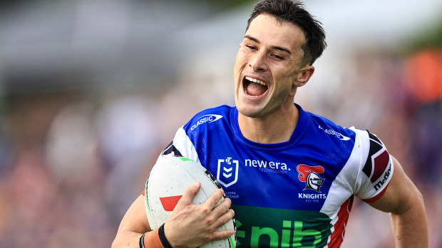 David Armstrong of the Knights smiles on his way to scoring a try during the round 10 NRL match between Wests Tigers and Newcastle Knights at Scully Park, on May 11, 2024, in Tamworth, Australia. (Photo by Mark Evans/Getty Images)