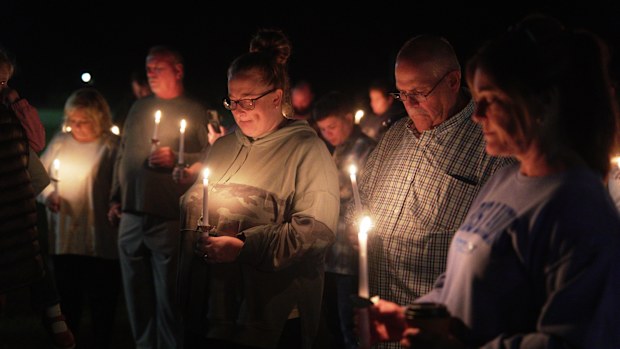 Residents attend a vigil honoring the victims of a blast at an explosives plant, Accurate Energetic Systems in Centerville, Tennessee, on October 10.