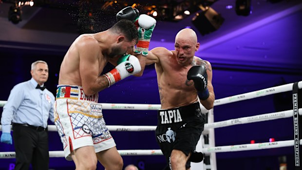 Cesar Mateo Tapia lands a right jab in his fight against Endry Saavedra which would be declared a draw.