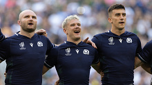 Scotland's Dave Cherry (left) with Darcy Graham (middle) and Cameron Redpath (right) sing the national anthem.