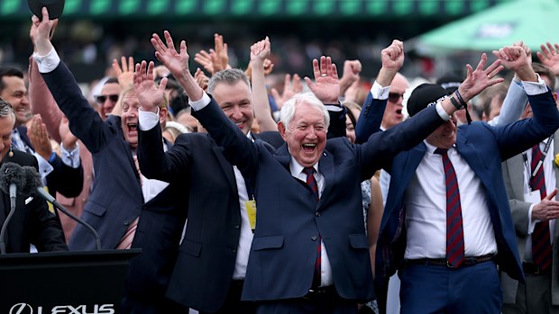Connections of Half Yours celebrate after winning the Melbourne Cup.