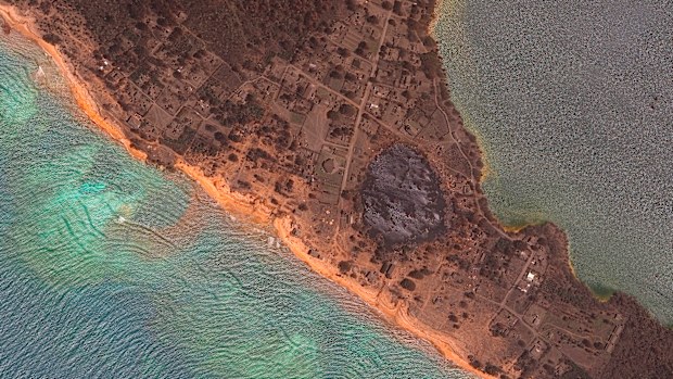 This satellite image provided by Maxar Technologies shows an overview of the damage on Nomuka in the Tonga island group on January 20 after the natural disaster. 