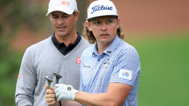 Adam Scott of Australia talks to Cameron Smith during a practice round ahead of the 2023 Masters Tournament at Augusta National.