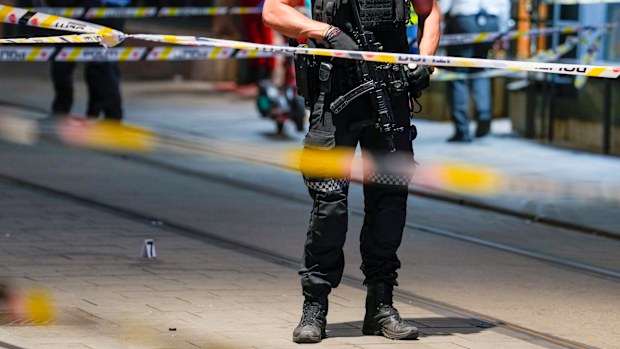 Police gather at the site of a mass shooting in Oslo, early Saturday, June 25, 2022. Norwegian police say a few people have been killed and more than a dozen injured in a mass shooting. (Javad Parsa/NTB via AP)