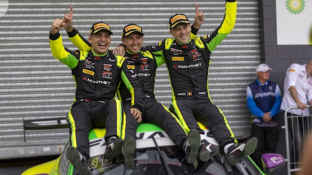 Ayhancan Guven, Matt Campbell and Laurens Vanthoor celebrating their win for Porsche in the 2024 Bathurst 12 hour.