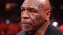 ARLINGTON, TEXAS - NOVEMBER 15:  Mike Tyson looks on before his fight against Jake Paul during LIVE On Netflix: Jake Paul vs. Mike Tyson at AT&T Stadium on November 15, 2024 in Arlington, Texas.   (Photo by Al Bello/Getty Images for Netflix © 2024)