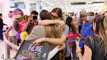 Passengers arrive at Sydney Airport off the first evacuation flight from Dubai since the airspace closed due to the US & Israeli conflict with Iran. Pic shows Alessandra Fuscaldo greeting family as she arrives. March 4, 2026.