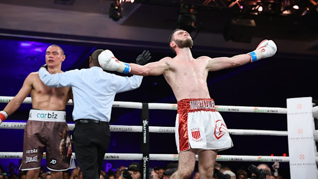 Bakhram Murtazaliev celebrating after defeating Tim Tszyu by TKO.