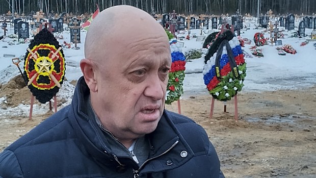 Wagner Group head Yevgeny Prigozhin attends the funeral of Dmitry Menshikov, a fighter of the Wagner group who died during a special operation in Ukraine, at the Beloostrovskoye cemetery outside St. Petersburg, Russia, on Dec. 24, 2022. 