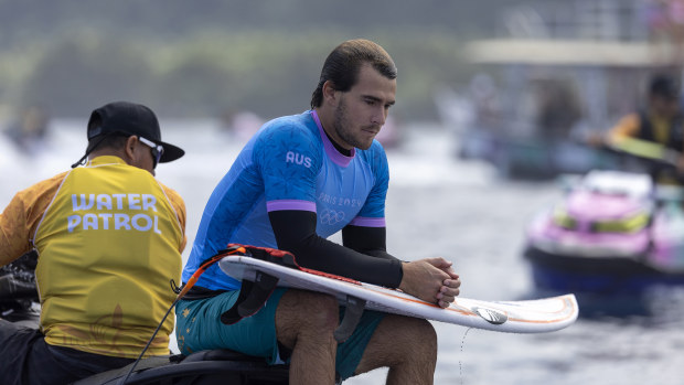 Jack Robinson of Team Australia looks on.