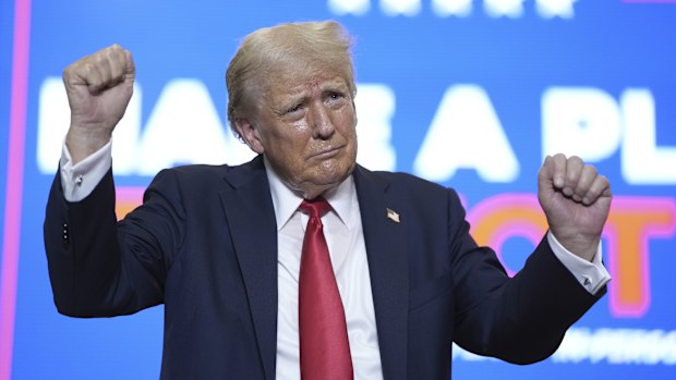 Trump dances as he wraps up the campaign rally in St Cloud, Minnesota.