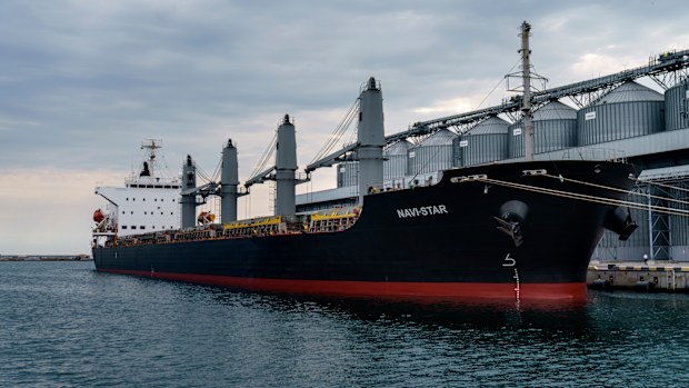 The ship Navi-Star sits full of grain since Russia's invasion of Ukraine began five months ago as it waits to sail from the Odesa Sea Port, in Odesa, Ukraine, Friday, July 29, 2022. (AP Photo/David Goldman)