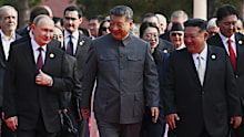 Russian President Vladimir Putin, Chinese President Xi Jinping and North Korean leader Kim Jong-un side-by-side at the parade.