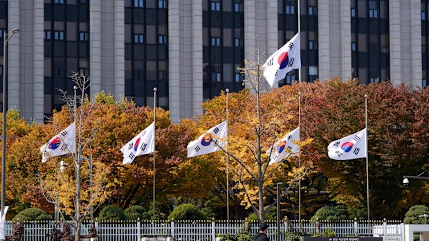 South Korean national flags fly at half-mast at the government complex in Seoul, South Korea.
