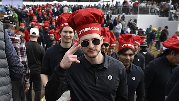 Fans of Aussie Min Woo Lee wear "Let Him Cook" chefs' hats during his second round at the 2024 Phoenix Open.