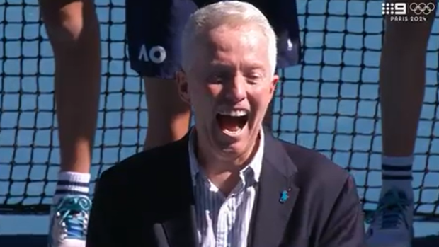 Tennis Australia CEO Craig Tiley couldn't hide his laughter after the pair forget their trophy.