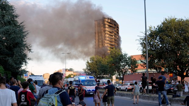 Smoke billows from a building in Milan, Italy.