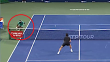 Frances Tiafoe won the point against Milos Raonic despite touching the net.