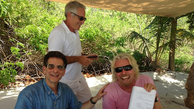 This undated photo released by Democrats on the House Oversight Committee shows Dean Kamen, left, Jeffrey Epstein, center, and Richard Branson. (House Oversight Committee via AP)