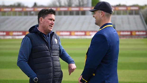Durham captain Alex Lees in his blazer chats with Marcus North prior to day one of the Rothesay County Championship.