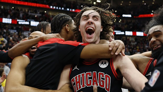Josh Giddey of the Chicago Bulls celebrates with teammates.