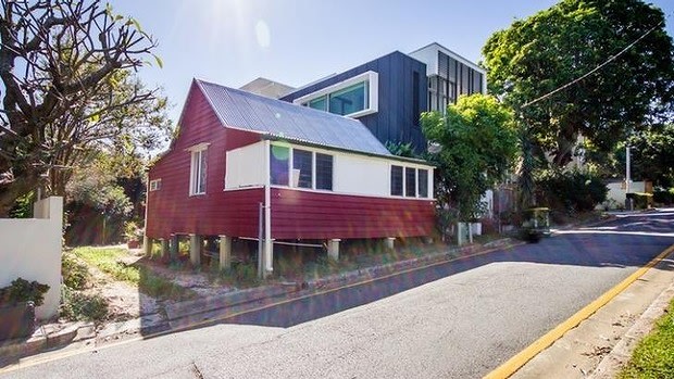 This tiny Brisbane cottage with an outside toilet and no separate bedroom sold for $960,000. (Supplied)
