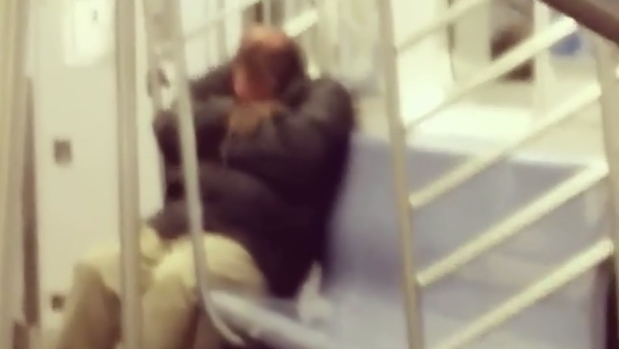 Antony Lin filmed a rat crawling over a sleeping man on a New York city train.