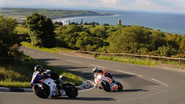 Practice laps for a TT Superbike race on the Isle of Man. The tiny self-governing island is considering giving up its roads to self-driving vehicles.