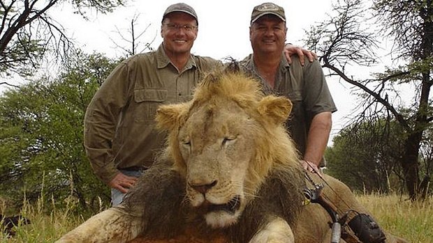 Hunter Walter James Palmer, left, with another lion he killed.