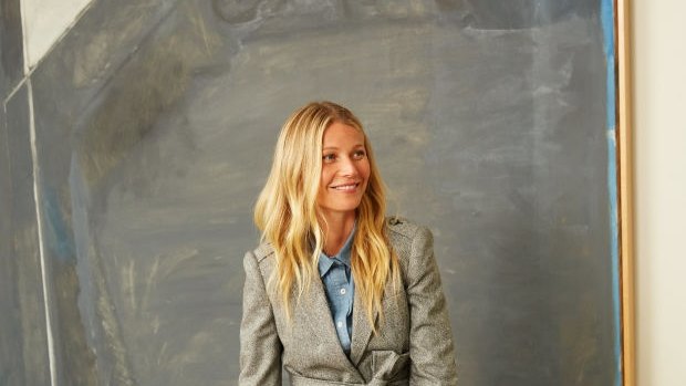 Gwyneth Paltrow wears a Goop style inspired by English schoolboy grey flannel suits.