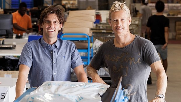 Surfstitch chief executive Justin Cameron (right, pictured with co-founder Lex Pedersen) is mulling a private equity-backed management buyout.