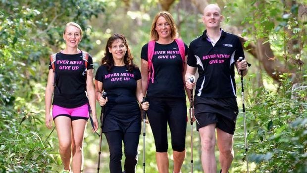 The Never Never Give Up team, Ros Graham, Caroline Marshall, Donna Sutor and Andrew Gannaway, are training in Noosa National Park to prepare for the 100km Oxfam Trailwalker charity event.