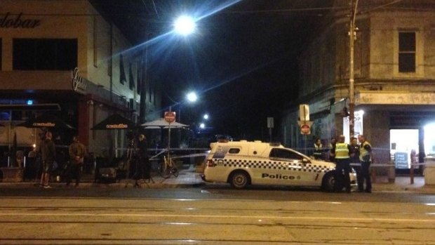 Police block St Phillip Street in Brunswick East after a man's body was discovered.