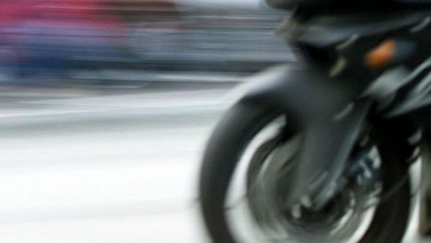 A motorcyclist will front court over the death of a car passenger.